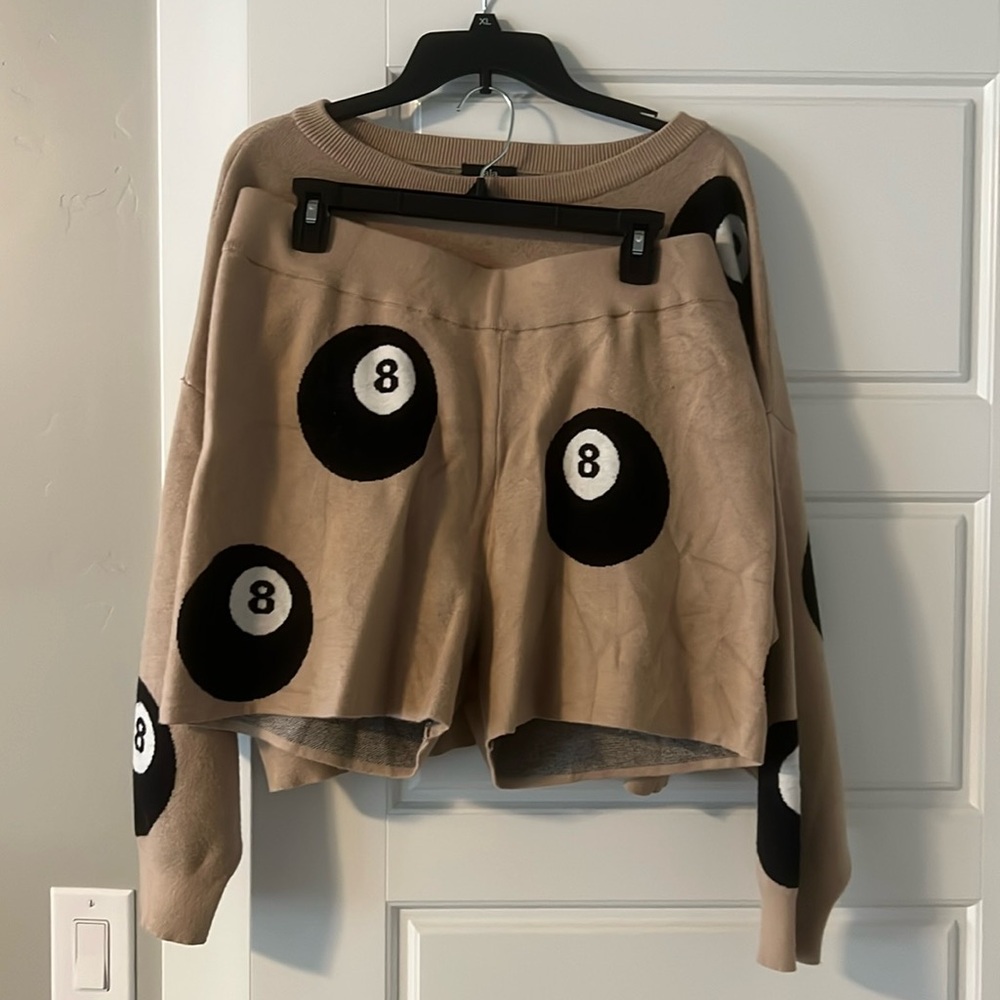 Dressed in Lala, 8 ball set, size XL, only worn a few times. Like new.